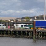 Six taken to hospital and two arrested after migrants found in lorry at Newhaven in East Sussex