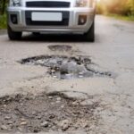UK roads in ‘miserable state’ as pothole-related breakdowns surge